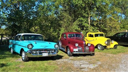 Three colourful classic cars